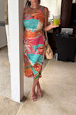 Loved this dress! Material was very stretchy and comfortable. The colors were amazing especially for a resort wedding as a guest! I got many compliments - Alison B.