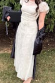 I loved the dress, wore it for my graduation. Really good material, feels a little bit itchy in the sleeves but it's not really a problem. - Mariana G.