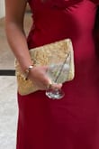 Love this little handbag and it's super cool that you can put it into a side body too! I was able to fit a lot inside, and it's always nice for a good touch of gold. - Alison B.
