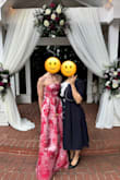 I wore this dress to a small, summer wedding in Atlanta. The material is nice and thick, and the corset type tie in the back gives you the ability to tighten or loosen the bust area to get the best fit. It's long, but with heels it was the perfect length for me (5'7").

I lift weights, so getting clothing to fit my back properly is always a concern, but this dress fit beautifully! Received TONS of compliments! - Lindsay M.