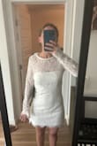 So cute and such a fun dress. Fits great and not too short. - KATIE A.