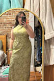 The top of the garment was made incorrectly and caused a ripple in the front. I contacted customer service and they were unable to help except suggest a return. The error caused the X straps to lay weird and tight. It felt like it was meant for someone who was taller than myself. Unfortunately there wasn't a larger size I could try and the dress replacement would not arrive in time for the wedding I wanted to wear it to. Errors noted with red markings on photos. - Amanda D.