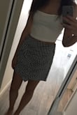 I like this skirt, but it's thinner/cheaper fabric than I had hoped for. 

The waist size is okay, it could be tighter so if you have a really skinny waist, keep that in mind! 

The length is perfect, not too short or too long on my 5'8" frame. I really like the design with the ruffle and the print, it's cute and summery. Great fabric for super hot weather since it's on the thin side. 

It'll look super cute with black or white tops and strappy sandals. Can be dressed up or down. I can't wait to wear when the weather gets warmer! - Tiana B.