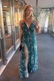 This dress is absolutely stunning on you- the two high slits are showstoppers when you walk! If you have toned legs, this dress will make you feel like a million bucks. I'm small chested (small B, but sadly deflated after 4 kids) and wore this dress with confidence with no bra/stickies. The adjustable straps are great and the back is just open and low enough. It's is flowy and gives a very Greek goddess vibe. A little long - I am 5'5 and the small was a littttttttle long with 3in heels, I did step on it many times, but the fabric held up nicely. I can't wait to wear it again! - Kristen C.