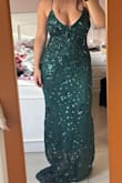 This is the most beautiful dress you're going to wear in your life. Don't think for a second whether to buy it or not. The moment I tried it on, it fits my body, it is elastic and comfortable. The sparkles are so beautiful and elegant. If you are a short person like me (157cm) it is most likely that you will find it a little bit long. - Guadalupe B.