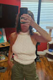 This top is so cute and flattering. It looks great with jeans and shorts. Nice material. - Donna B.
