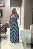 I'm 5'3 and a little busty. I was concerned it was too revealing but husband gave the the thumbs up. Purchased a small. - Teresa S.