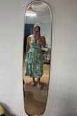 I wore this dress for a wedding in Florida. It was super breathable and comfortable. The neck tie hurt a little bit because I had to tie it so tight. The top is a little too big as my breasts are smaller. Otherwise, definitely recommend! I bought size XL. - Kaloni S.