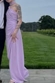 I got this for a summer wedding and it was great! Comfortable fit and easy to move in! I decided to tuck the scarf in so it didn't fall down when I leaned forward. Didn't realize it had a slit in it until I got it, but I liked that it wasn't too high. The color is just like in the photos! I would highly recommend for anyone with a straight/athletic build! - Kayla L.