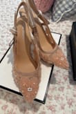 Good heel size and pretty shoe.  Runs about 1/2 small - Maria M.