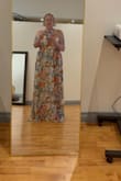 I very much love this dress. I normally wear a 12-14, and I ordered an extra large and extra extra large of this dress. The extra extra large is what it fit, except in the bust. I had to have it altered a little bit, but I wouldn't change anything. The link is very long. I think if you're 6 foot or a little taller, the length would be perfect. It was a little long for me, and I'm 5'10. - Rosanna M.