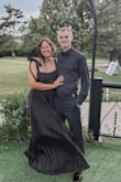 I wore this dress to a black tie wedding, as I did love it. It was very long and the straps were not adjustable, so I recommend sizing down. I wore a size L for reference. - Megan F.