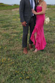 This bright pink dress was perfect for a June wedding I attended recently. It was very flattering and fit perfectly. It was slightly stretchy yet fit every curve to my body. The ruffle detailing was a very cute touch too which got a lot of compliments from others. - Barbara C.