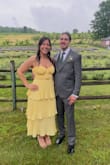 I wore this dress to a wedding this weekend and got so many compliments! The color was beautiful, it fit true to size, and it was comfortable to wear all day. My only complaint is that mine appeared to have a manufacturing defect. The fabric on the sections around/ between my chest stuck out and wouldn't lay flat. It had been sewn incorrectly 100% in the section between my breast. It looked like it slipped through quality control? I was less than a week away from my event, so I didn't have time to exchange it, but thankfully it still photographed well and did the job. If not for the quality issue, I would have given it 5 stars. I made my boyfriend pull down on the sides to help reduce the bunching, but you can see how bad it got in the second photo. No matter how much I pulled down on it, it would stay bulgy because it should've been sewn differently/given more attention while it was being manufactured. - Danielle G.