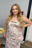 This dress is gorgeous!! It's light and airy! The ruching on the side gives the dress more movement rather than a plain dress that falls straight down!! - Ireland M.
