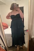 The corset looking top is not actually a corset, so my boobs were falling out the whole time I was wearing it. Tightening the straps didn't seem to help very much. Otherwise was very pretty and flowy. If my boobs were bigger it might have worked better. I'm a 32C and I got an XL. - Jossy S.