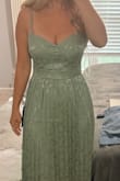 This dress is very pretty and fit well. If it had pockets I would've kept it! Liked it, but found something else on Lulus that I loved for my brother's wedding. - Bluey B.
