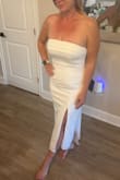 I love this dress! Fit is superb, the fabric is so nice, the length is perfect for me and I LOVE the bow. I didn't have issues with it coming unsnapped. - Emily G.