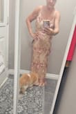 I love it. I read the reviews that it runs small. I usually wear a small but sized up to a medium. So glad I did, fits perfectly. - Julie D.