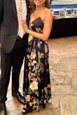 Love this dress; I have worn it twice now. Once to a California outdoor but black-tie wedding, another time to a gala. I lost a little weight, so I had it taken in a little the second time and pinned at the bust so I didn't have to wear anything under. Tons of compliments. Love the slit! - Cameron G.