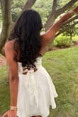 Got this dress for my graduation & loved it! It fit true to size & was not tight nor loose. - Jisha S.