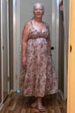 I'm between medium and large sizes, so the reviews said the dress runs large, so I ordered a medium, and I'm so happy with the fit. This is for a beach wedding, and it's going to be perfect! - Juanita L.