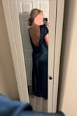 I bought this dress to wear as a guest to a black-tie wedding, but ended up returning it and going with something else. Ultimately, this dress fit quite well (the material has very little give, so thank goodness it did). As a curvier girl, I just ultimately decided I couldn't get away without wearing a supportive bra, and the design of this dress has such a low back that even my "backless bra" could not be worn with it. I also found that the slightly scooped neckline was not flattering on me, which made the front of the dress look quite plain, although the back was such a wow. All this to say, it may work well for others, but just not for me. - Olivia R.
