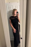 I bought this dress to wear as a guest to a black-tie wedding in the summer. The material is relatively breathable, which should be fine for a summer event. The ruching is lovely and really accentuates my curves while being forgiving and smoothing. The gathering in the shoulder mesh looks a bit odd in person and is hard to situate nicely on my shoulders, so I may have to wear some fabric tape to hold it in place during the event. The length is a tad short on me (at 5'8"). As someone who normally wears M/L, the L is quite small and constricting, which I don't love, but again, the ruching slightly hides the snugness. Overall, it is flattering, classy, and understated with just a touch of uniqueness, which is what I was going for. I am keeping it as a backup for the event as I think it will work fine, but still looking around to see if I can find a slightly better fit in length and size. - Olivia R.