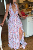 This dress shows a little bit of everything! Some cleavage, a little leg, and the whole back! It accentuates the right parts and covers the not-so-desirable. The color and the floral design is stunning, and it fits perfectly! Bought it for a wedding in August! It will definitely be an eye-stopper! Recommend to anyone who wants to feel amazing! - Kerri D.