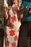 I bought this for a wedding in Greece. The dress runs big. I ordered a medium and was able to slip it over my hips. I bought the small, and it fit better on my hips and back. Not as much material flowing in the front in the small, but I preferred that. - JENNIFER S.