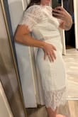 I bought this dress for my bridal shower, and it is absolutely perfect! It's so classy, fits well, and is good quality. The only thing is it's just slightly tight on my shoulders if I raise my arms, but I have more athletic arms. Otherwise it's perfect! - Bree-Anna B.