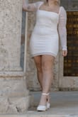 I bought this dress for engagement shoot photos, and it really was so cute! It is a little short, and I'm short, so I imagine it would be maybe too short for taller women. The material was stretchy and comfortable, and the sleeves fit well on my athletic arms, which I was worried about. It really doesn't have much structure in the body, so if you're looking for a dress to hide your belly, this isn't it, but it's still cute - Bree-Anna B.
