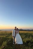 I brought this dress on my mountain (yep, mountain!) vacation trip because you just never know when or where you could get engaged lol. My boyfriend took me on a mountain hike showing 360° views of Tennessee and North Carolina all around. Then he got down on one knee. He surprised me by having our photographer bring my dress with her so I could change into it for our engagement shoot. Naturally, it was a little long and hard to run in on a grassy mountain patch, but it still felt perfect on me. Straps fell at times while photographing but nothing unmanageable. I've gotten so many compliments on the dress specifically from family members and friends who've seen our pictures. I truly felt like a princess wearing this dress. - Christina M.