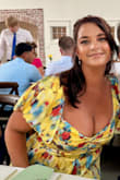 Beautiful dress, vibrant colors, soft, silky fabric and lightweight. 
Loved this dress for curvy girls. Covers and hides all the right areas and provided a flattering waistline. However, it's VERY busty if you're
blessed in the chest area. I was a little uncomfortable with the amount of cleavage shown, but the top was tight enough to where everything stayed in place. Loved the dress...could have used a bigger, deeper bust line - Katy K.