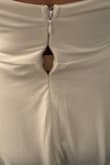 I got this dress for my wedding. Tried it on, fit perfectly and I loved it. Fast forward to my wedding day and the zipper brakes! 30 minutes before my wedding!! I put it on and the zipper was snaggy, finally got it up and then it popped open in the middle and kept getting worse with every little movement I made. Then we couldn't get it back down to try to fix it. I had to safety pin my dress the entire length of the zipper to keep it together on my wedding day. so frustrating! - Kayla P.