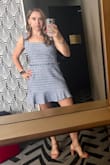 This was such a cute dress that I got so many compliments on it! It runs big and I am small in the chest. I got it altered to bring the straps up and it was so cute and nice quality. Now I need this style in a fall color. P.s. funky hotel mirror had a weird divider on a full length mirror. - Jennifer B.
