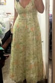 I cannot wait to wear this dress! It's a rare find for me when a dress fits me perfectly. It's a great length on me, and the light green pattern is so beautiful. I am so excited about this dress! The straps might be a little loose, but there is a tie in the back that helps. I would appreciate a bit more room in the bust, as I have DD cups, but that is to be expected, I fear. So cute! - Ellie B.