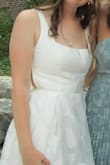 The quality is so amazing. The dress came folded, so I had to steam it, but it's a beautiful dress it was slightly tight, but not tight enough to size up. I'm 5'7 and the dress was about 1-2 inches on the floor. Great dress for a great price. - Liberty P.