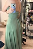 I ordered the size medium, and it fit well over my hips, but there was a huge gaping in the back. I returned it for a size small, and the waist fit much better, but the bust and hips were much tighter. The dress pulled in odd ways because of this. Next time I'll just get a tailor. - Alyse G.