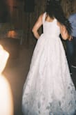 Chose this as my wedding dress for a summer barn wedding since I didn't want to spend lots of money for a dress that I might not wear many times. The length was perfect. I ordered a large to have room for tailoring since I have a larger bust, but wanted it to fit my small waist (it's not tight around the belly though so enjoy your food!). Tailoring was no problem. The dress has three layers and the bottom layer is quite smooth but synthetic. I was worried since it was super hot that day, and I brought an extra dress but never had to change. It was super comfy and nice on the skin. I walked a lot in grass and soil, danced for hours and it still looked amazing! - Rebecca L.