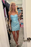 It fits tight but perfectly. The color is a Cinderella blue, and the sequins really sparkle. - Kristin O.