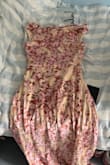 Loved the floral pattern and spent a long time searching for champagne and gold dresses; this is rare! Now, I received a dress that matched-ish my skin tone (doesn't wash me out, personally) and had the pink and red to not clash but complement my BA Arts and Humanities gown I will be wearing to graduation. It fits nicely around the hips, a little tight on top, but I haven't figured out how to hang the cowl back yet! Otherwise, beautiful colour till I tanned on holiday haha and see thru. Did take advice and being small but with a chest I went size Medium! The material does look like £86 rather than an over £100 dress. Another Lulus option I had before this, sadly, was not sewn correct arm hole length be careful, but I was so happy with this early Grad find during exams!! - Annelise V.