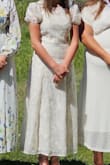 Dress was worn for a baptism celebration. Very pretty, modest. Not see-thru. Fit is exact to size; does not stretch, has no give (if unsure of size id say definitely size up). Delicate details, very well made, full zipper in back. - Natalia S.