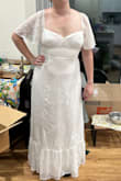 The dress is well made but the flowy sleeves didn't look good on my hourglass figure. - Meg M.