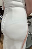 Could see my underwear/bra through the fabric. Also, not flattering for girls with a tummy. - Meg M.