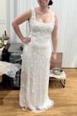 Well made gown. A bit heavy from the beads but the straps are comfy. Wish it hugged my curves a bit tighter but overall a great gown. Wearing for my rehearsal dinner. - Meg M.