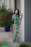 The fabric is so soft and flowy, moving beautifully with every step. It fits perfectly and enhances my figure in all the right places, making me feel confident, elegant, and comfortable at the same time. I've received so many compliments every time I wear it! If you're looking for a dress that's flattering, classy, and effortlessly beautiful, I highly recommend this one. It's definitely become one of my favorite pieces! - Thuylinh D.