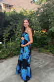 I am usually an XS, but I am 25 weeks pregnant, and I sized up to a small, and it fit very comfortably! I'm 5'4 with 2-inch heels on and didn't need altering. - Rachel H.