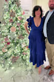 This dress is a show stopper! The color is absolutely divine and it fits just right to make it forgiving on big bellies!! It is flowy, beautiful and worth it! - Patricia F.