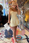 Super cute dress, fits nicely, enhances body curves, a little see through so you gotta pick the right underwear. Got a bunch of compliments! - Alianda S.